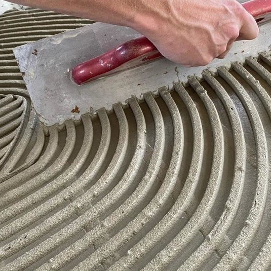 Welke vertanding gebruik je bij tegelen? - Tegeleend